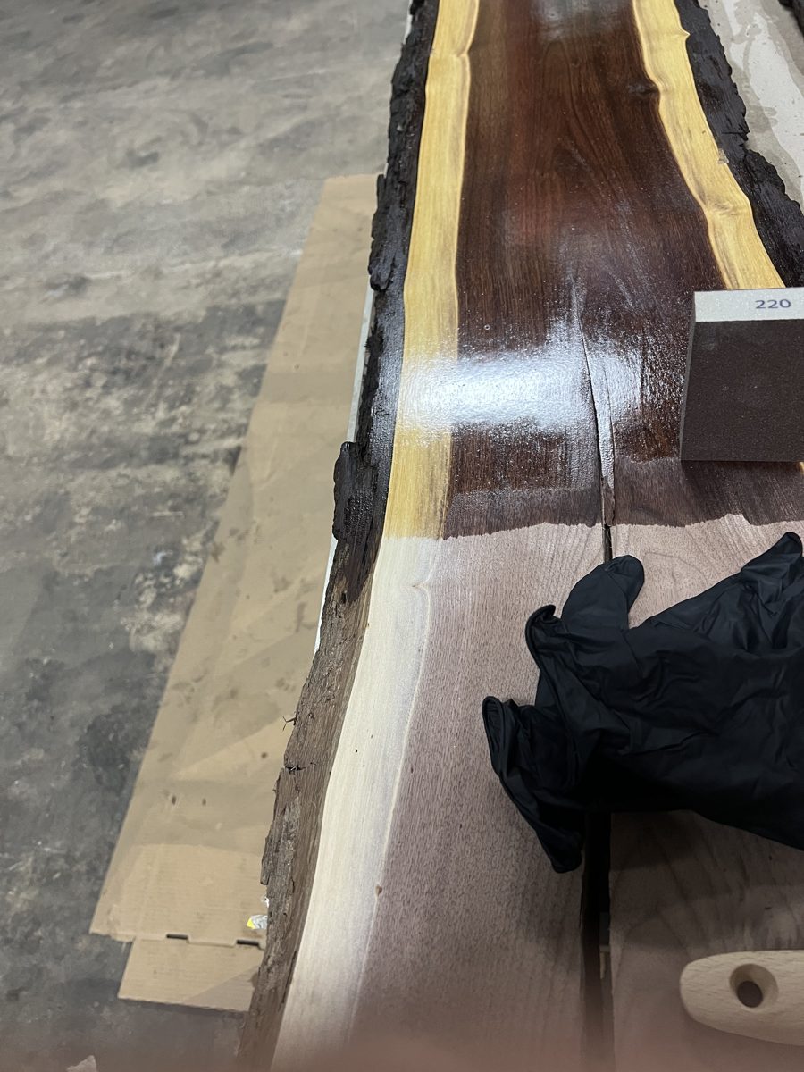 Close-up of the high-gloss live edge