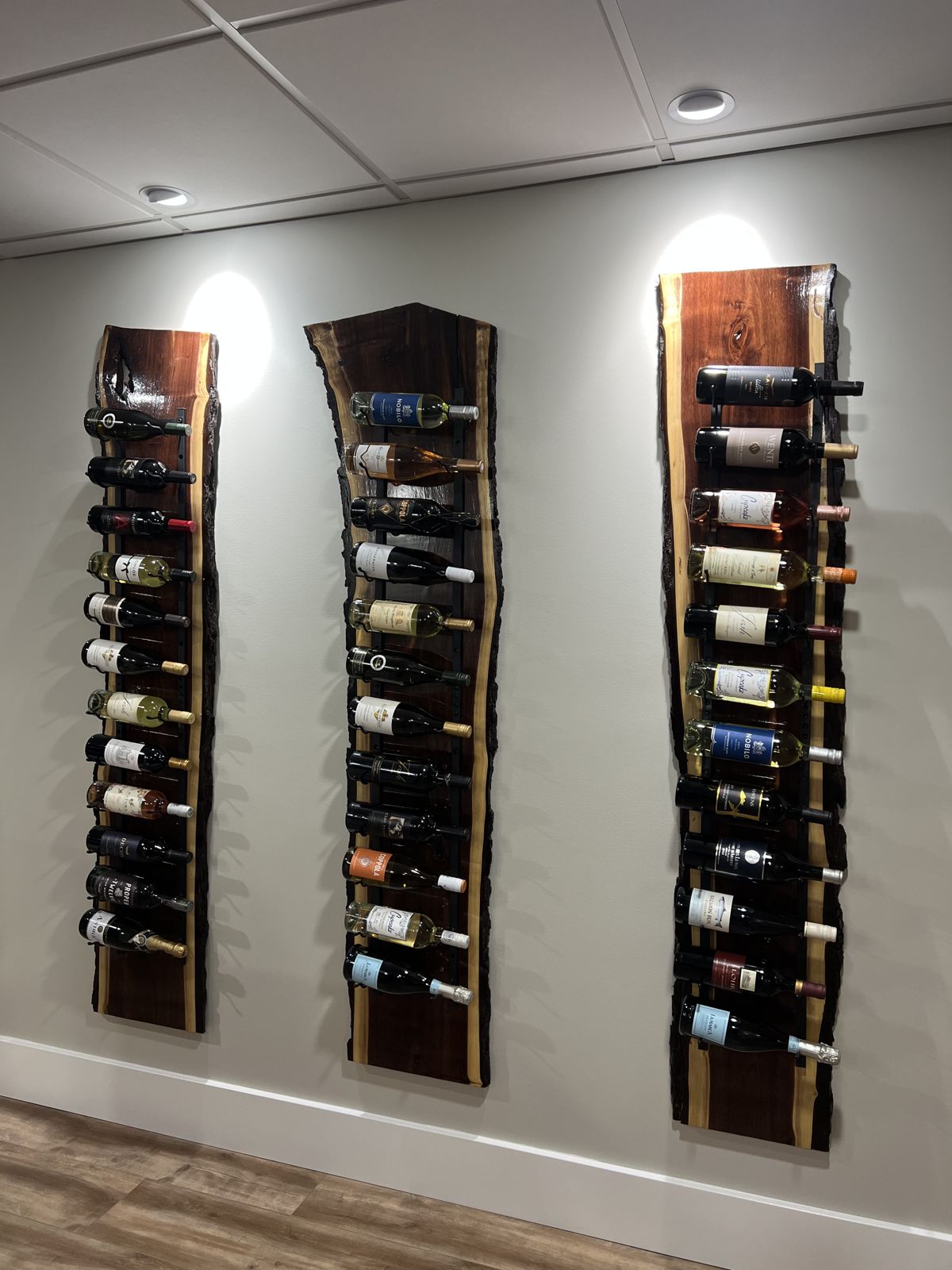 Three walnut wine racks, front view