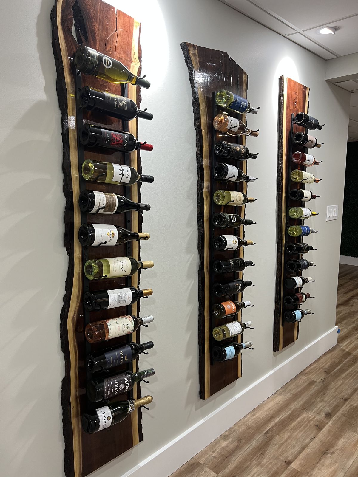 Walnut wine racks with recessed lighting